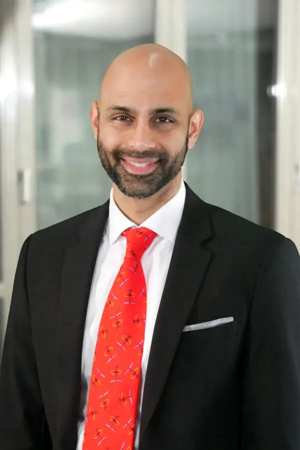 a man in a suit and tie